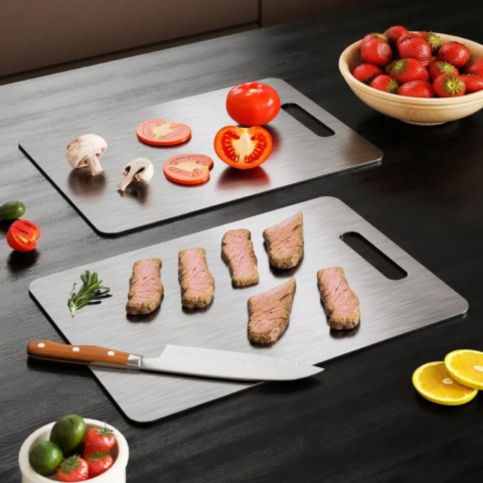 Two Katori titanium cutting boards with sliced tomatoes, mushrooms and steak